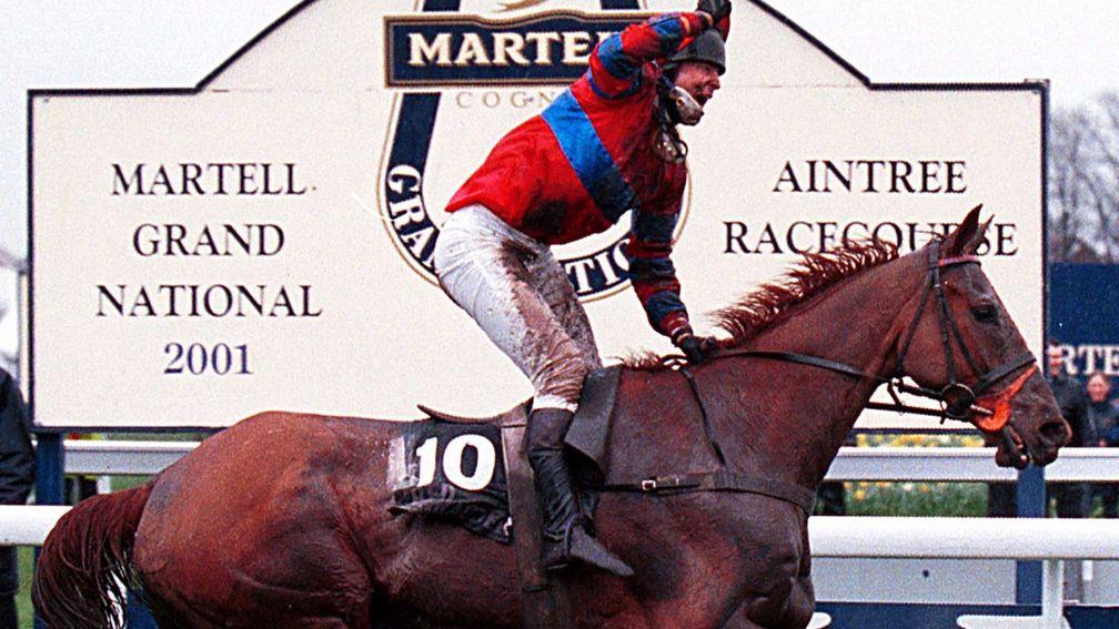 Richard Guest celebrates after winning the 2001 Grand National on Red Marauder