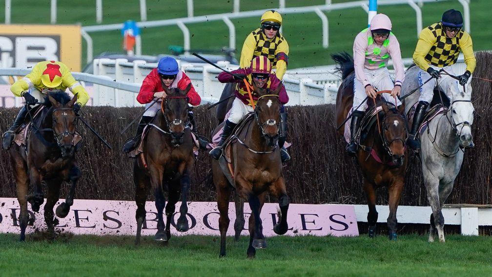 Protektorat (left) gives chase, but was no match for A Plus Tard (blue cap) at Cheltenham