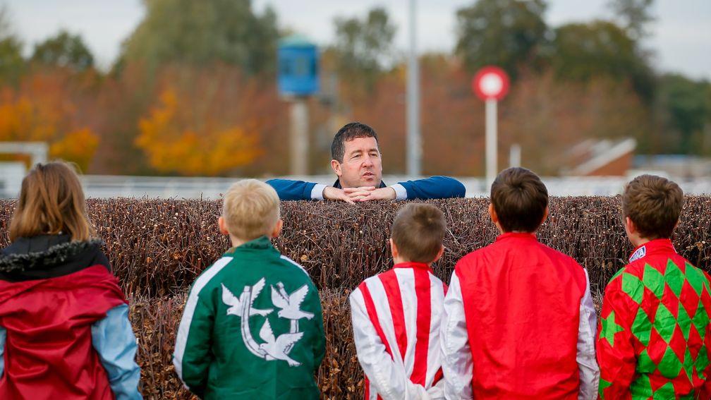 The larger obstacles: Ollie McPhail gets the kids up close to a chase fence
