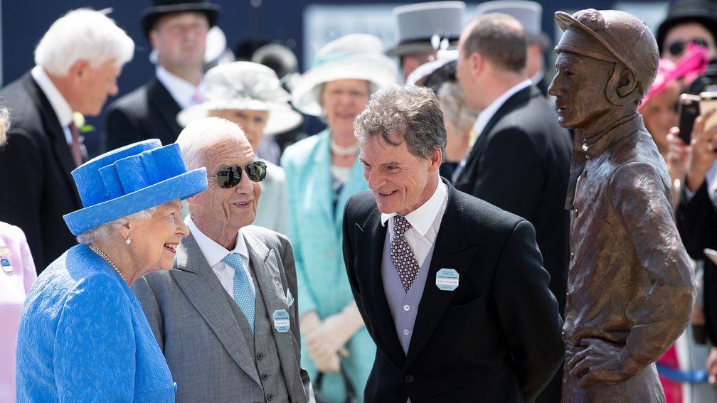 The Queen and Lester Piggott in 2019 at the unveiling of his statue at Epsom