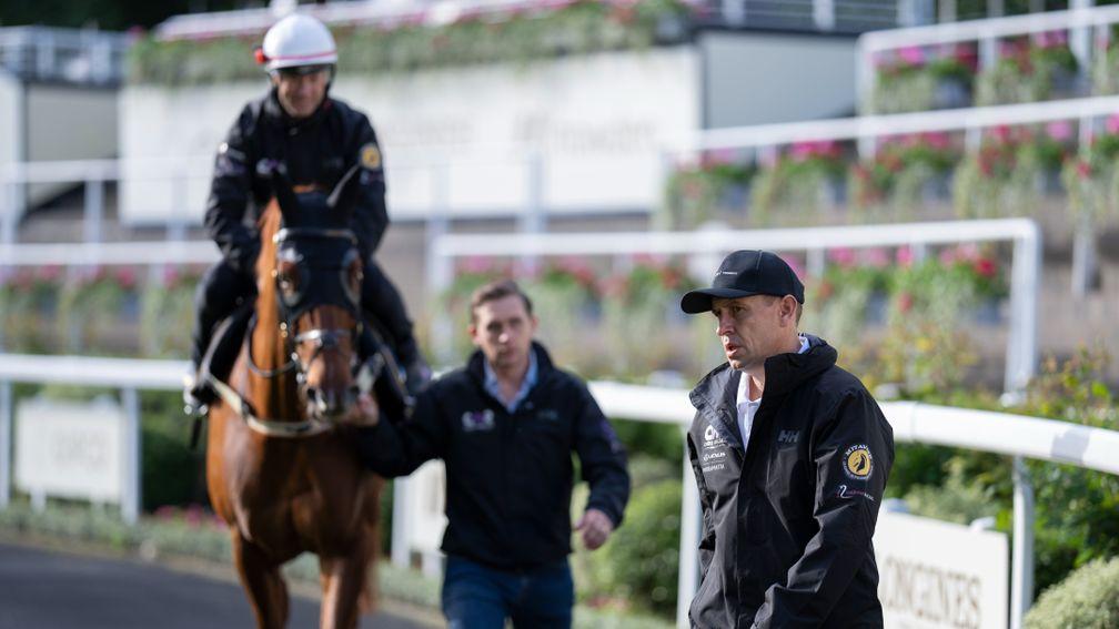 Australian trainer Chris Waller watches his assistant Charlie Duckworth lead  Nature Strip around the parade ring before galloping at Ascot10.6.22 Pic: Edward Whitaker