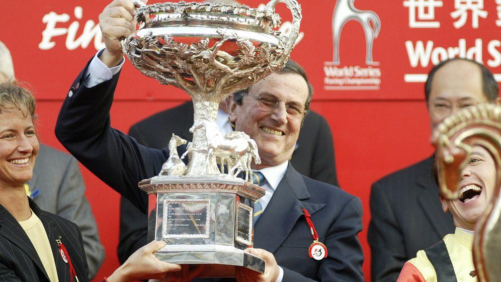 Luciano Salice holds aloft the Hong Kong Cup after Falbrav's victory