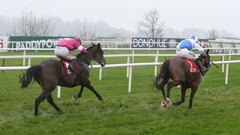 Apple's Jade (left) sets off in pursuit of Jer's Girl in the Knight Frank Juvenile Hurdle at Leopardstown in December 2015