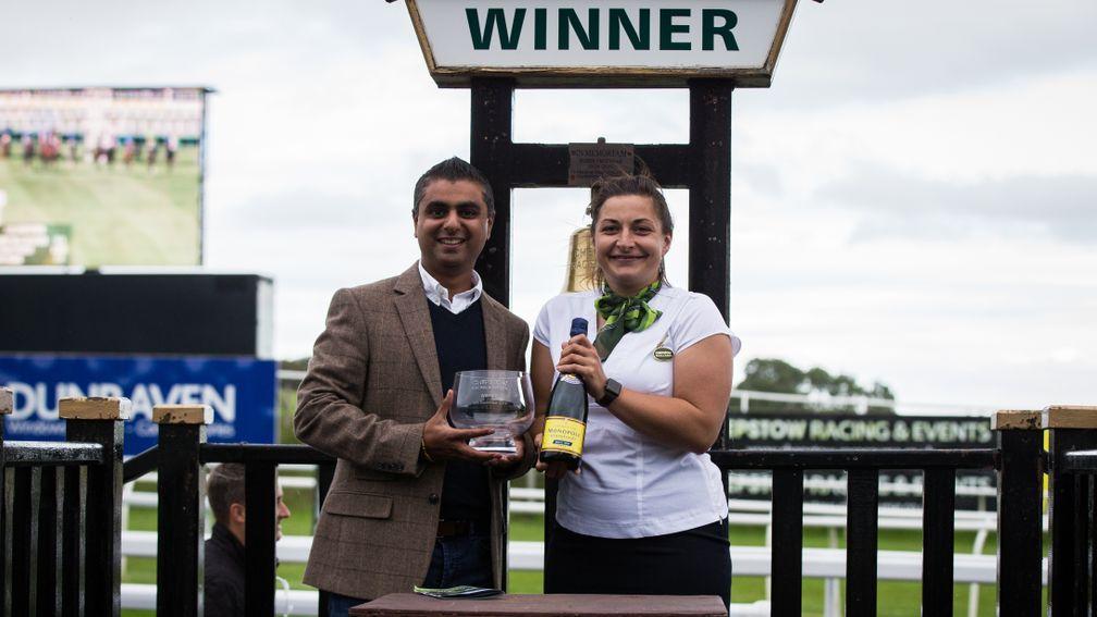 Hicky Parmar with his trophy for Paddy The Chef's success at Chepstow in September 2019