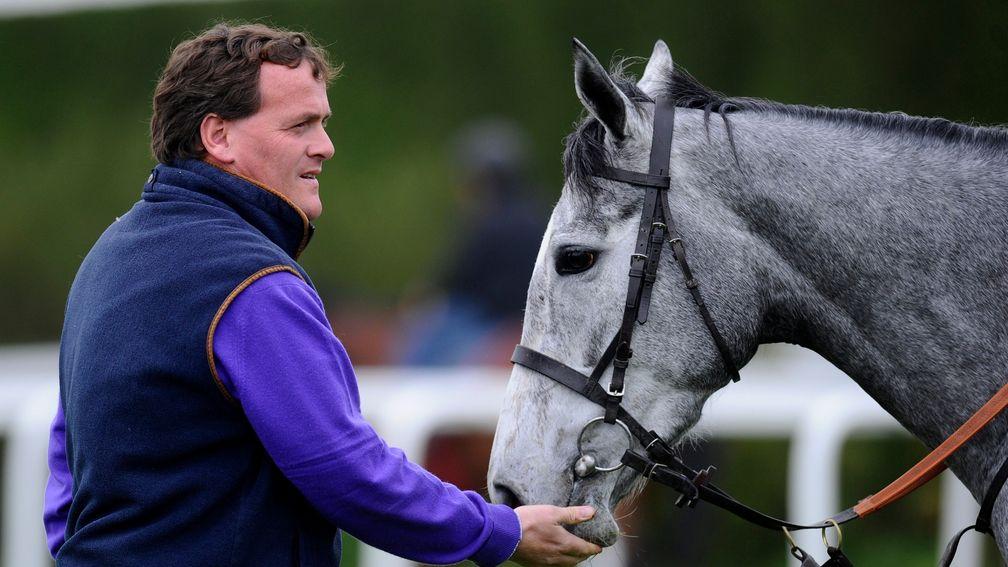 MARLBOROUGH, ENGLAND - APRIL 22: Richard Hannon with Sky Lantern during a visit to Richard Hannon's Herridge Racing Stables on April 22, 2014 in Marlborough, England. (Photo by Alan Crowhurst/Getty Images)