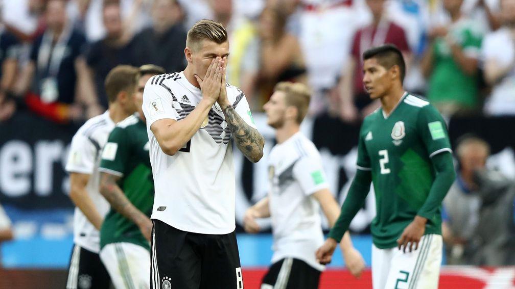 Toni Kroos of Germany stands dejected after losing to Mexico
