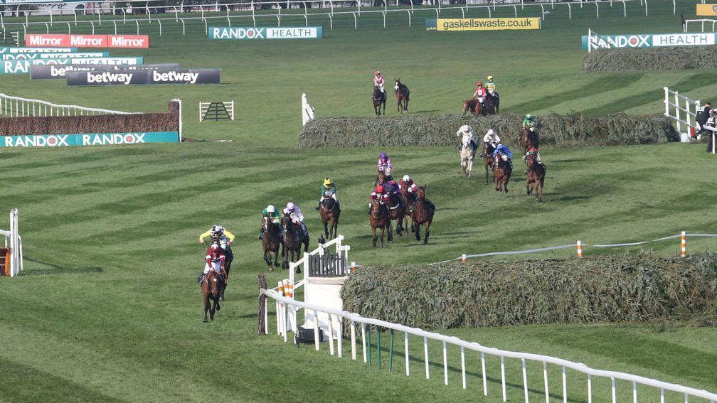 Tiger Roll and Davy Russell lead the field towards the Elbow in the 2018 Grand National