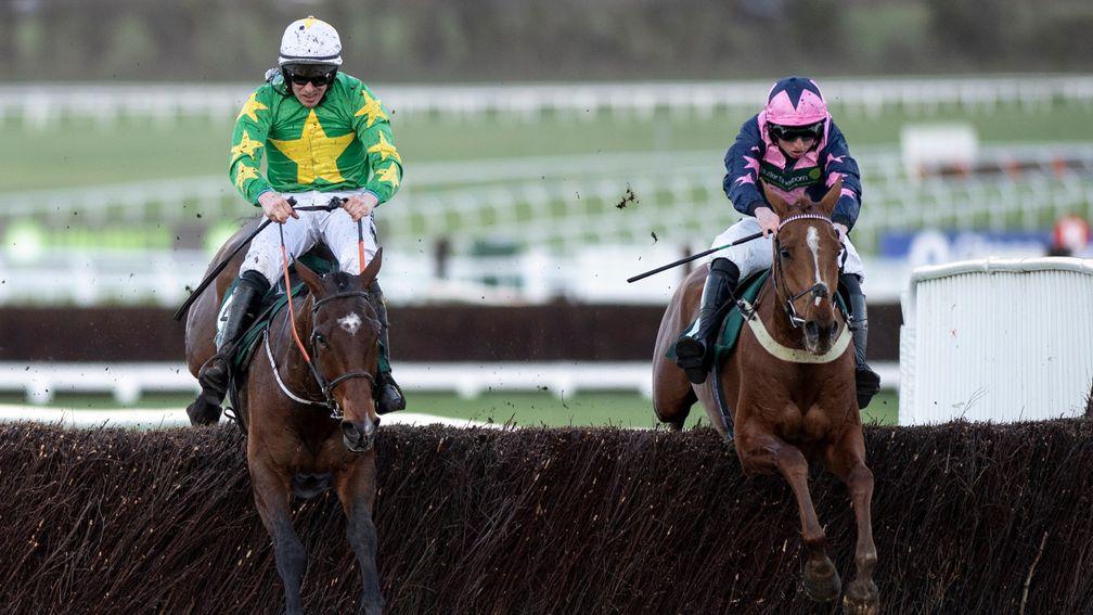 Le Breuil and Jamie Codd (right) win the National Hunt Chase ahead of Discorama (left)