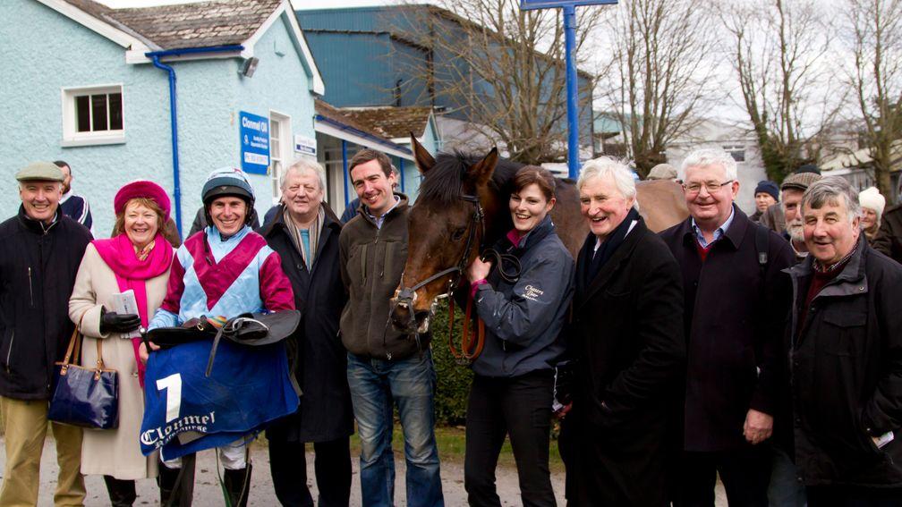 Ivor Dulohery (third from right nearest horse) and his fellow syndicate members celebrate a win from Westerner Point at Clonmel in 2015