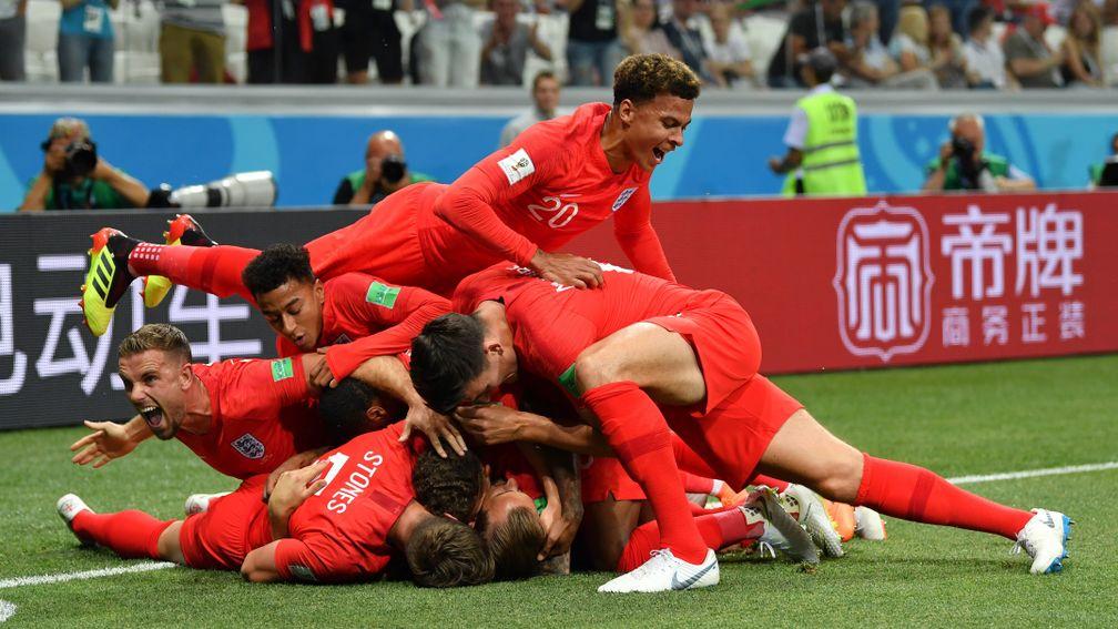 England players celebrate Harry Kane's opener against Tunisia