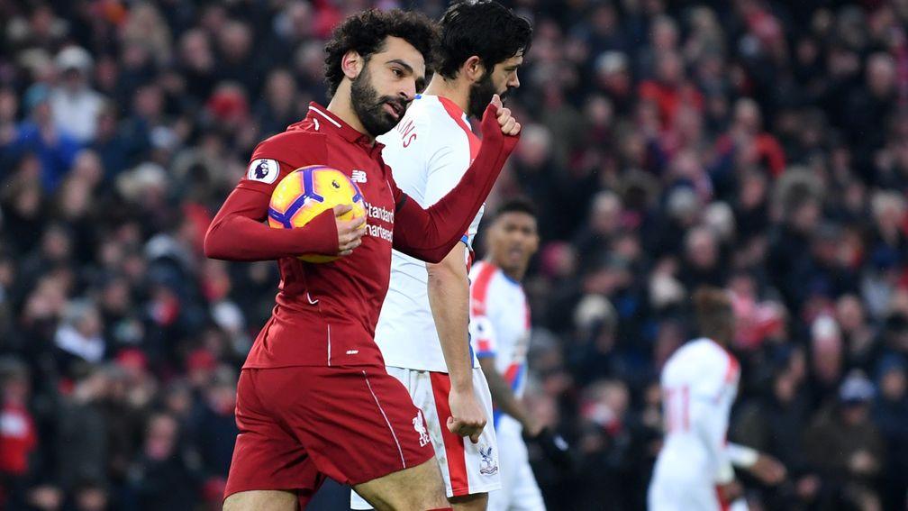 Mo Salah of Liverpool celebrates after scoring against Crystal Palace