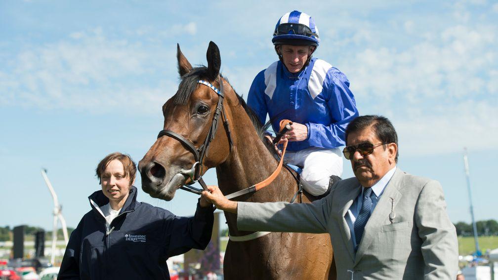 Taghrooda being led in by Sheikh Hamdan after winning the 2014 Epsom Oaks