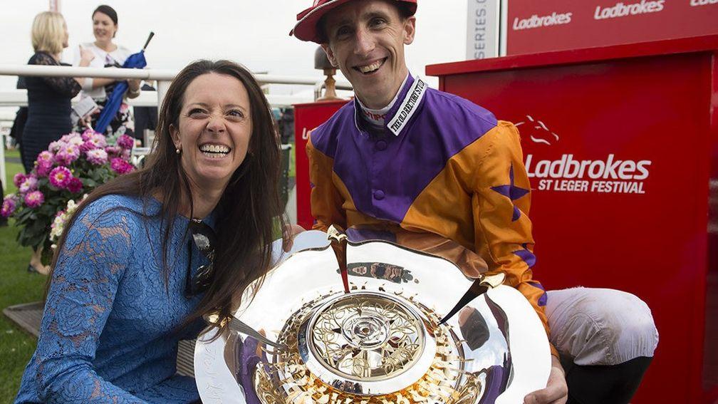 All smiles: Laura Mongan and George Baker celebrate their memorable St Leger success at Doncaster