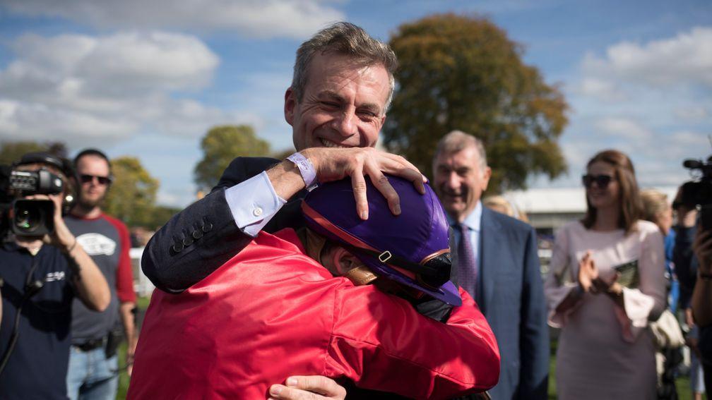 Patrick Prendergast and Ronan Whelan embrace after Skitter Scatter's win in the Moyglare Stud Stakes
