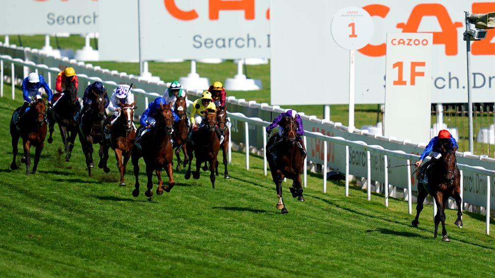 EPSOM, ENGLAND - JUNE 05: Adayar ridden by Adam Kirby (right) on their way to winning the Cazoo Derby during day two of the Cazoo Derby Festival at Epsom Racecourse on June 5, 2021 in Epsom, England. (Photo by John Walton-Pool/Getty Images)
