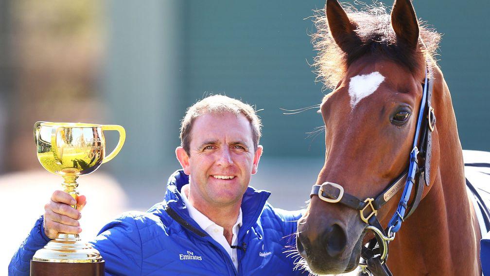 Charlie Appleby poses with Cross Counter and the Melbourne Cup