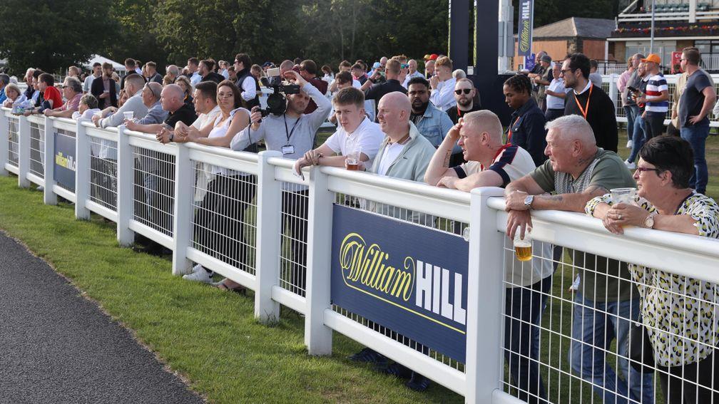 Punters watch on at the first of six Racing League meetings