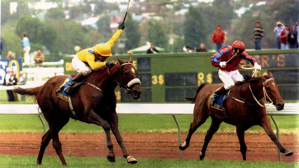 Mick Kinane drives Vintage Crop (left) on to win the 1993 Melbourne Cup