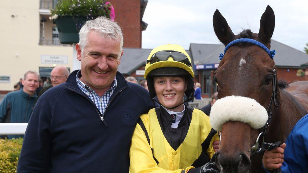 Ella McCain poses with her father Donald following a victory at Carlisle