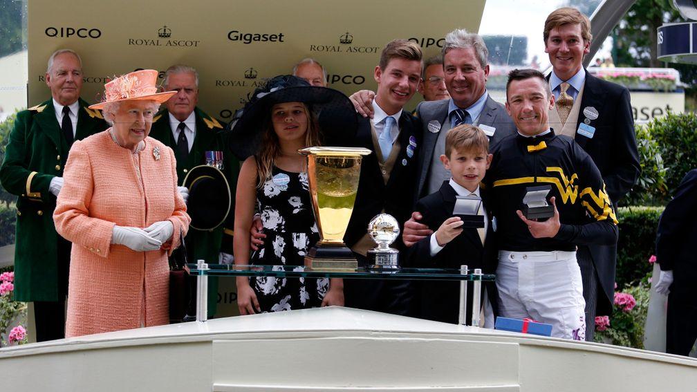 ASCOT, ENGLAND - JUNE 20: Queen Elizabeth II prsents the Diamond Jubilee Stakes with winning jockey Frankie Dettori and trainer of Undrafted Wesley A. Ward during day 5 of  Royal Ascot 2015 at Ascot racecourse on June 20, 2015 in Ascot, England.  (Photo b