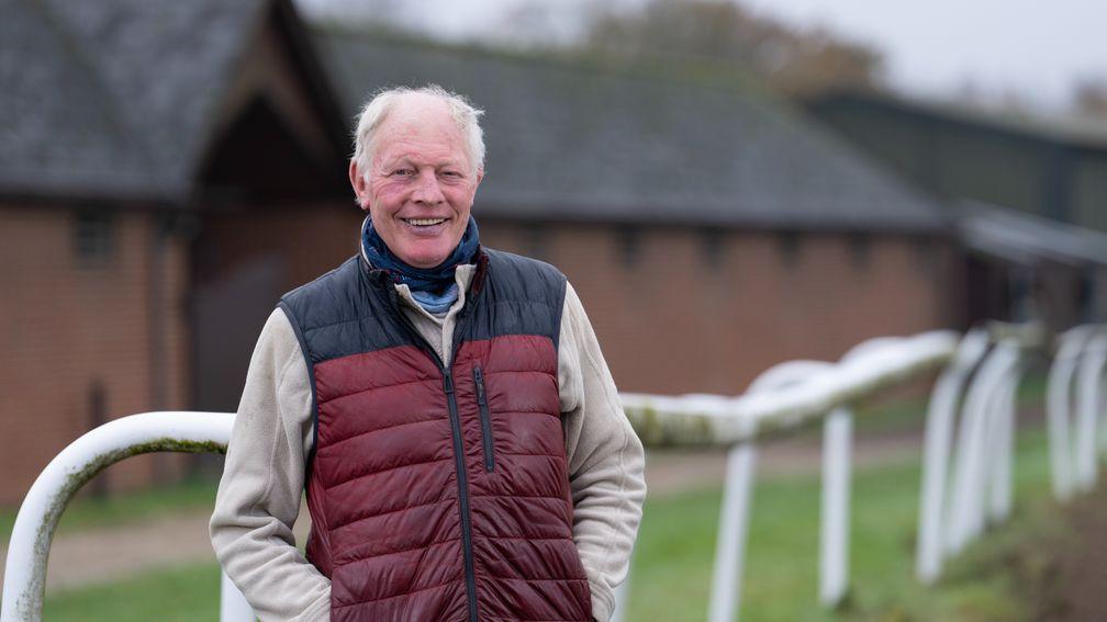 Happier times: Gary Moore has a smile on his face again as he prepares to hand over the licence at Cisswood Stables to son Josh