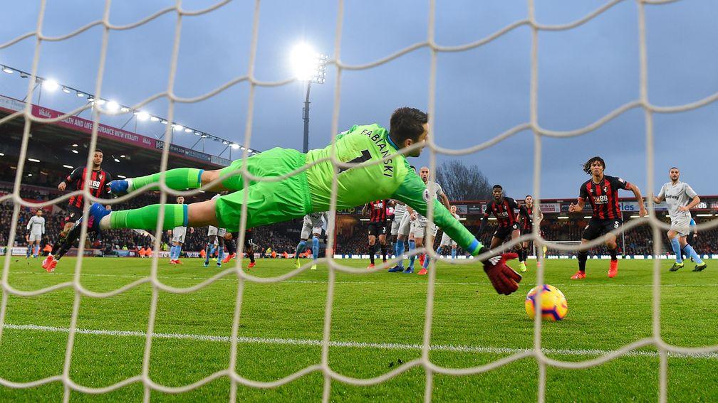 Lukasz Fabianski of West Ham makes a save against Bournemouth