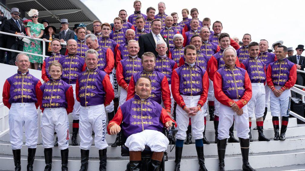 Jockeys line up and Nicky Henderson in the Queen's coloursEpsom 4.6.22 Pic: Edward Whitaker