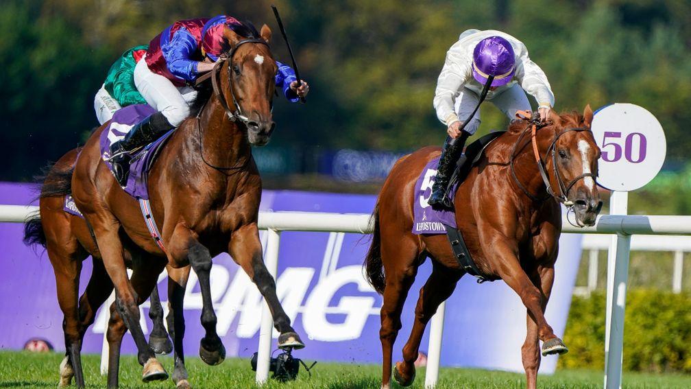DUBLIN, IRELAND - SEPTEMBER 10: Ryan Moore riding Luxembourg (blue/maroon) win The Irish Champion Stakes from Stephane Pasquier riding Onesto (white) at Leopardstown Racecourse on September 10, 2022 in Dublin, Dublin. (Photo by Alan Crowhurst/Getty Images
