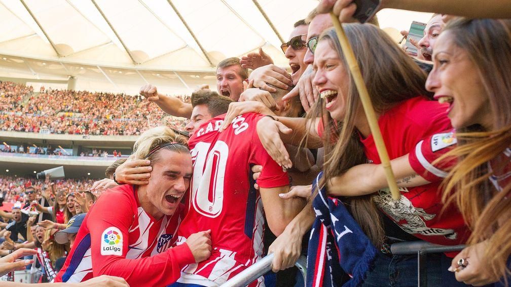 Atletico celebrate their win over Sevilla