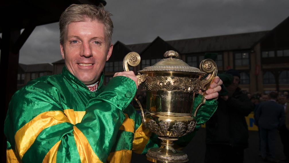 Golden moment: Noel Fehily looks pleased as punch with the trophy following his victory on Unowhatimeanharry in the Champion Stayers Hurdle