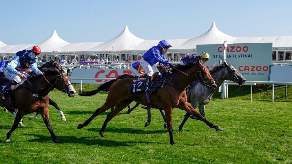 DONCASTER, ENGLAND - SEPTEMBER 08: Gary Bardwell riding Natural Colour (blue) win The Mondialiste Leger Legends Classified Stakes at Doncaster Racecourse on September 08, 2021 in Doncaster, England. (Photo by Alan Crowhurst/Getty Images)