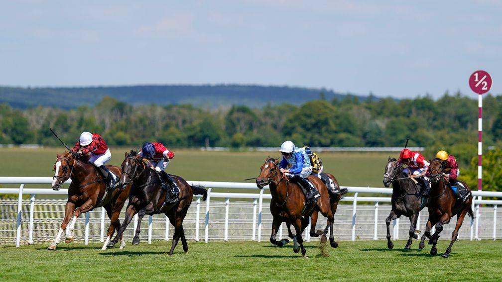 CHICHESTER, ENGLAND - JULY 29: Tom Marquand riding Rocchigiani (L, red/blue cap) win The Bonhams Thoroughbred Stakes during day four of the Qatar Goodwood Festival at Goodwood Racecourse on July 29, 2022 in Chichester, England. (Photo by Alan Crowhurst/Ge