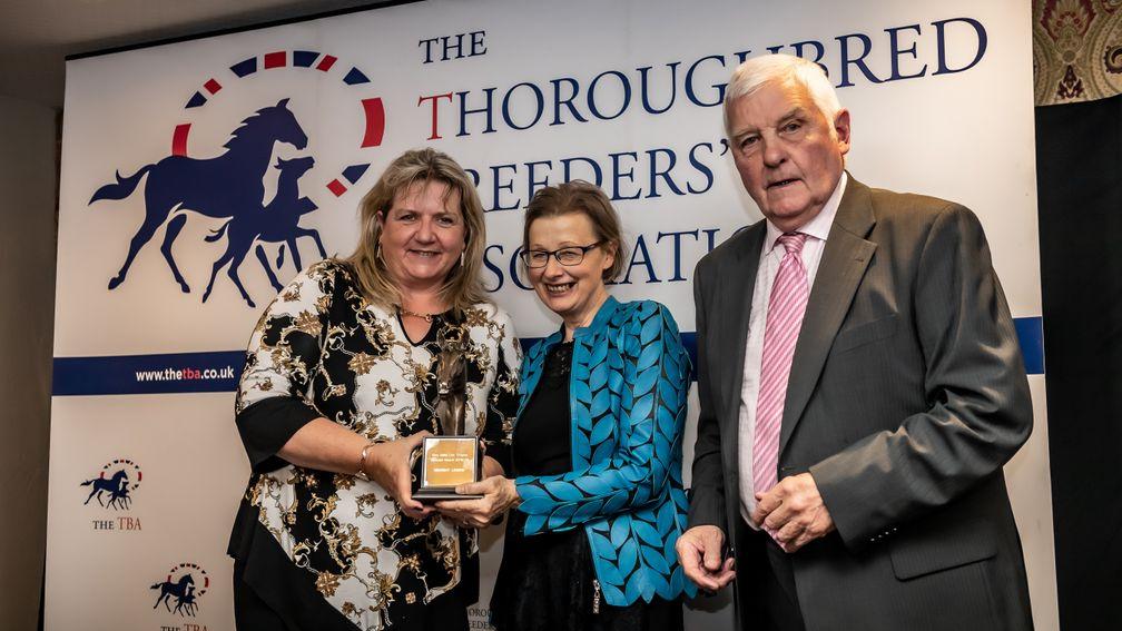 David and Kathleen Holmes receive the Eric Gillie Ltd Trophy, which was posthumously awarded to Midnight Legend in May in recognition of his enduring legacy