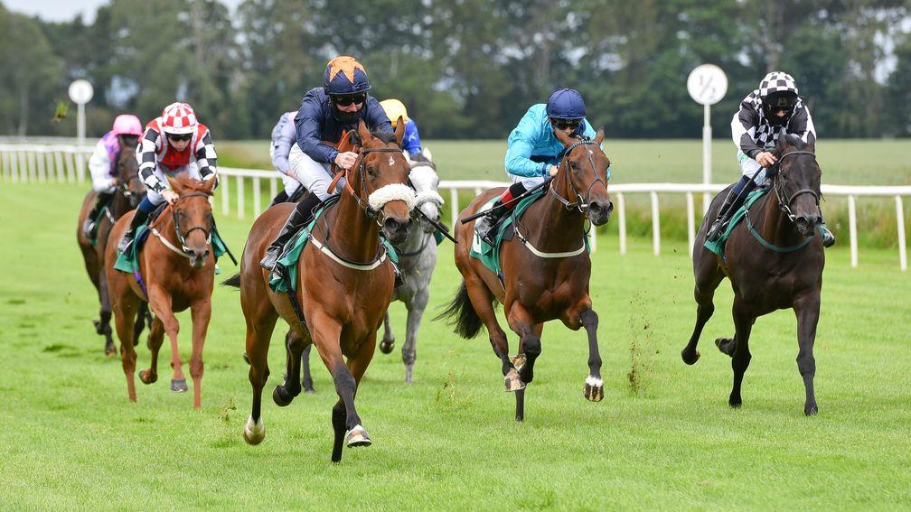 THIRSK, ENGLAND - JUNE 22: Tom Eaves riding Hala Hala Hala approach the finish line to win the British Stallion Studs EBF Maiden Fillies' Stakes at Thirsk Racecourse on June 22, 2020 in Thirsk, England. (Photo by Hannah Ali/Pool via Getty Images)
