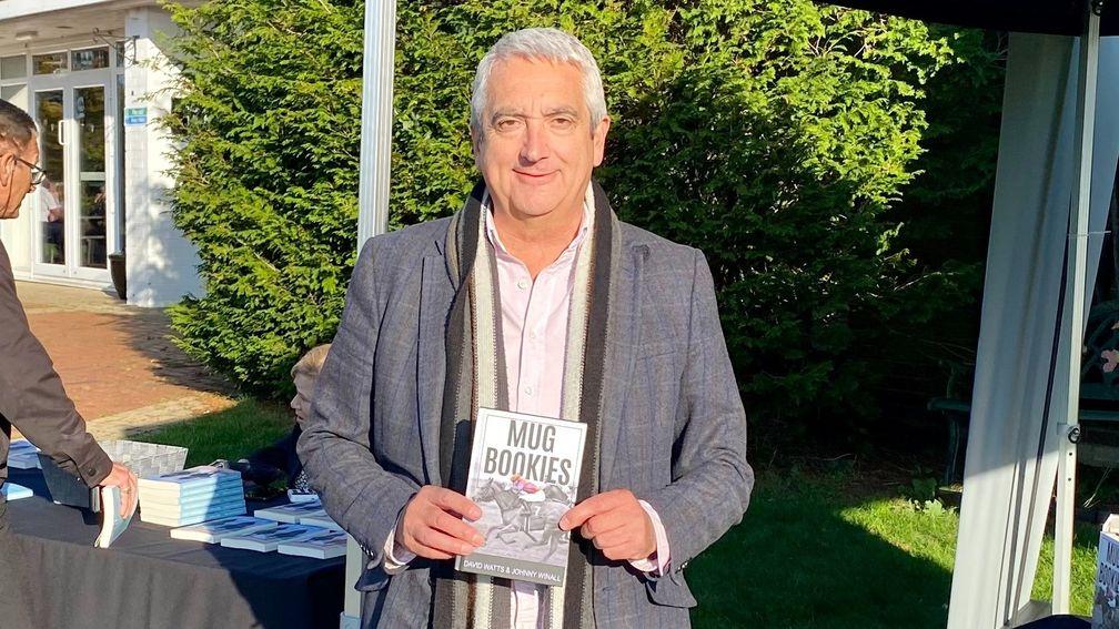 Johnny Winall selling his book at Lingfield last month