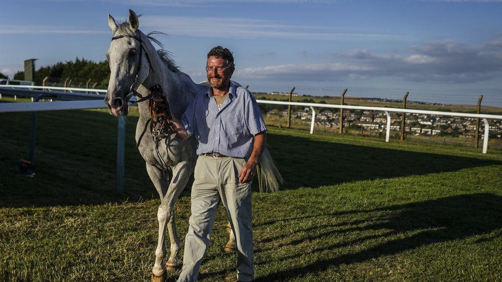 BRIGHTON, ENGLAND - JULY 10:  Trainer John Berry with Roy Rocket Brighton Racecourse on July 10, 2018 in Brighton, United Kingdom. (Photo by Alan Crowhurst/Getty Images)