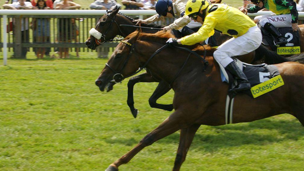 Khor Sheed (yellow) wins the Listed Empress Stakes at Newmarket under Kieren Fallon