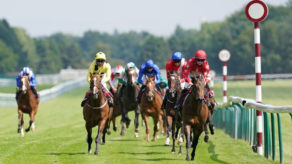 NEWTON-LE-WILLOWS, ENGLAND - JULY 01: Mr Mccann and Jane Elliott (right) coming home to win the British EBF Novice Stakes at Haydock Park Racecourse on July 1, 2021 in Newton-le-Willows, England. (Photo by Martin Rickett - Pool/Getty Images)