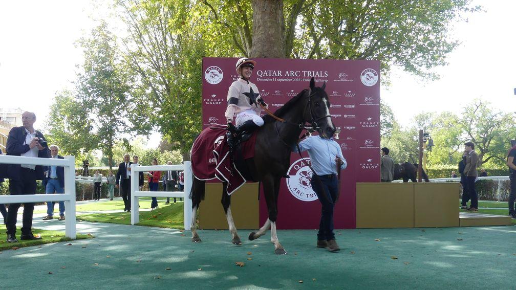 Iresine and Marie Velon return to the Longchamp winners' enclosure after victory in the Group 2 Qatar Prix Foy