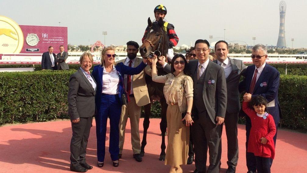 Johnny Hon (third right) with Global Spectrum after the Al Biddah Mile at Doha