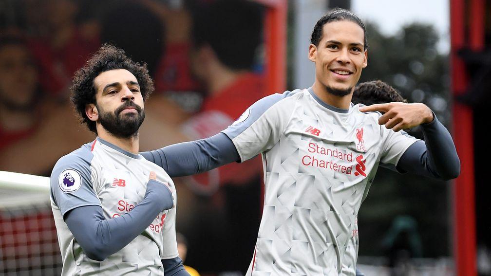 Liverpool stars Mohamed Salah and Virgil van Dijk celebrate at Bournemouth