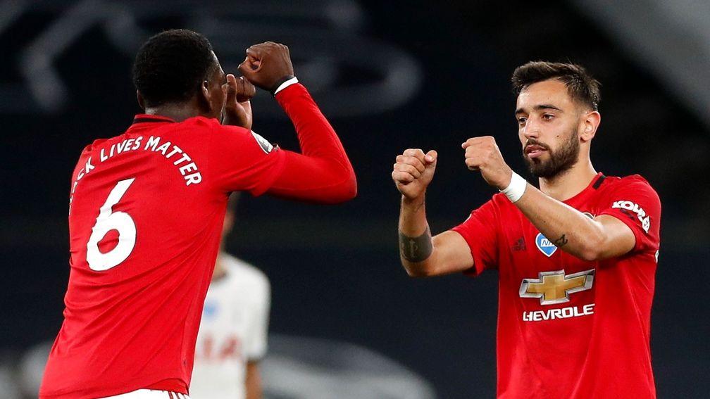 Manchester United's Bruno Fernandes of celebrates with teammate Paul Pogba