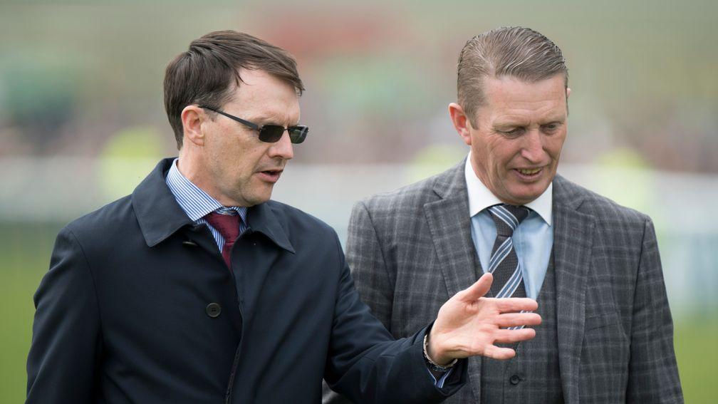 Aidan O'Brien, long renowned for thanking every member of his team after a victory, consults his travelling head lad Pat Keating