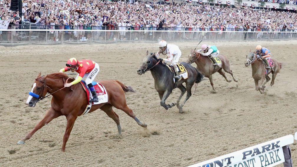 Justify (left) - from Scat Daddy's penultimate crop - wins the Belmont Stakes and Triple Crown