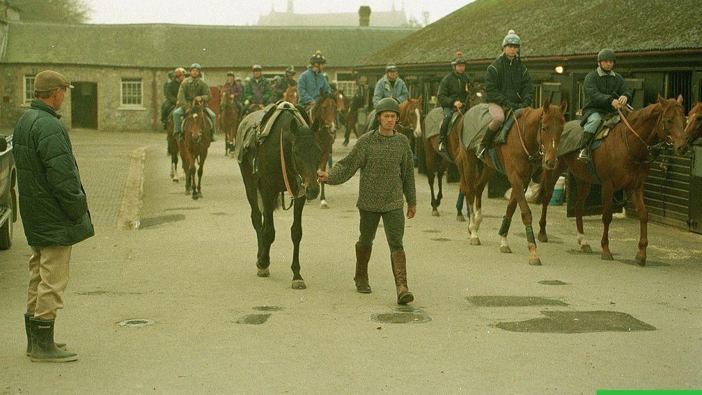John Dunlop (left) oversees his string at his Arundel stables during his heyday