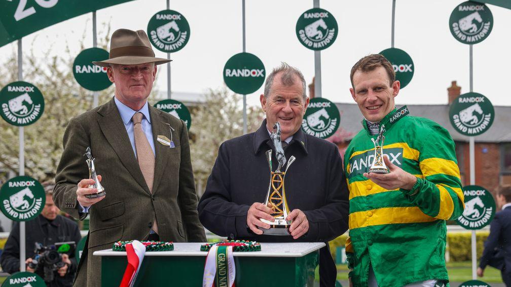 Willie Mullins, JP McManus and Paul Townend pose with their Grand National trophies