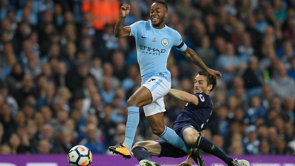 Raheem Sterling tries to evade the challenge of Leighton Baines in Manchester City's draw with Everton in August