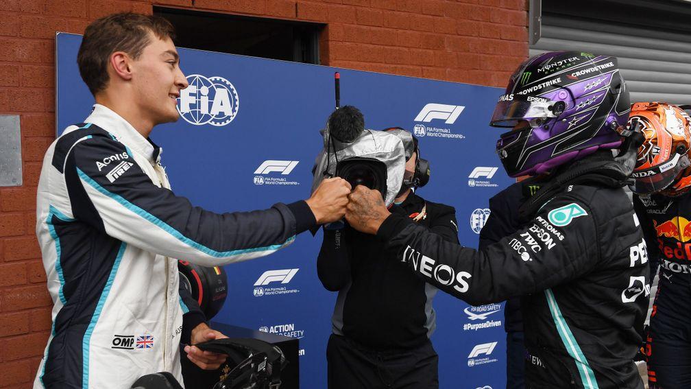 George Russell (left) and Lewis Hamilton will be teammates at Mercedes next year
