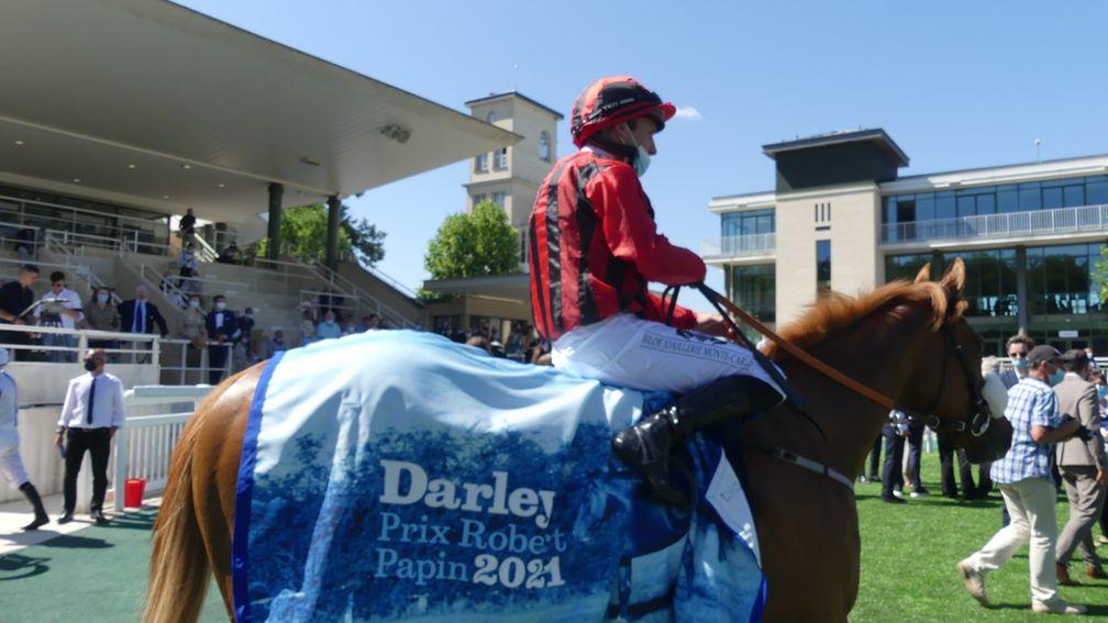 Atomic Force and Stephane Pasquier return to the Chantilly winner's enclosure after landing the Darley Prix Robert Papin