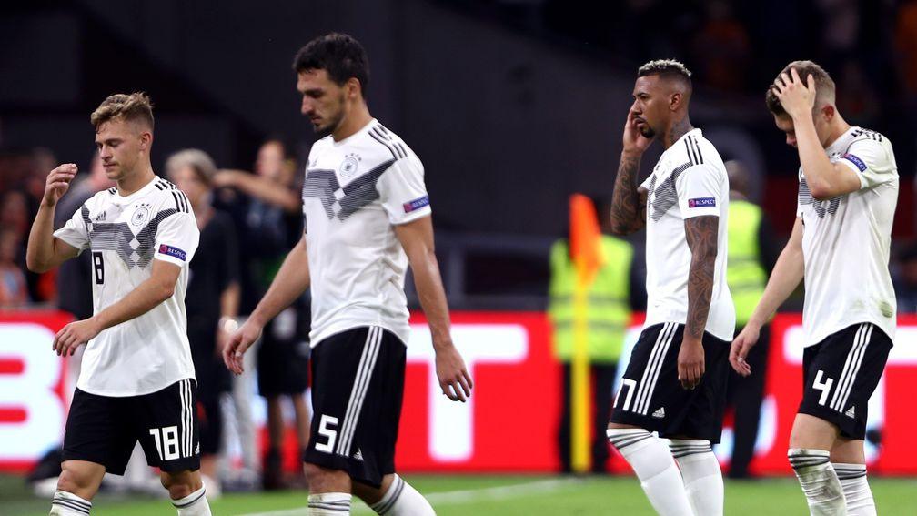 German players look dejected after losing to Holland